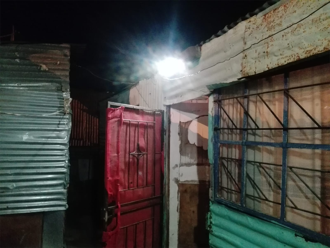 Wall-mounted solar lights in a settlement in Cape Town. 